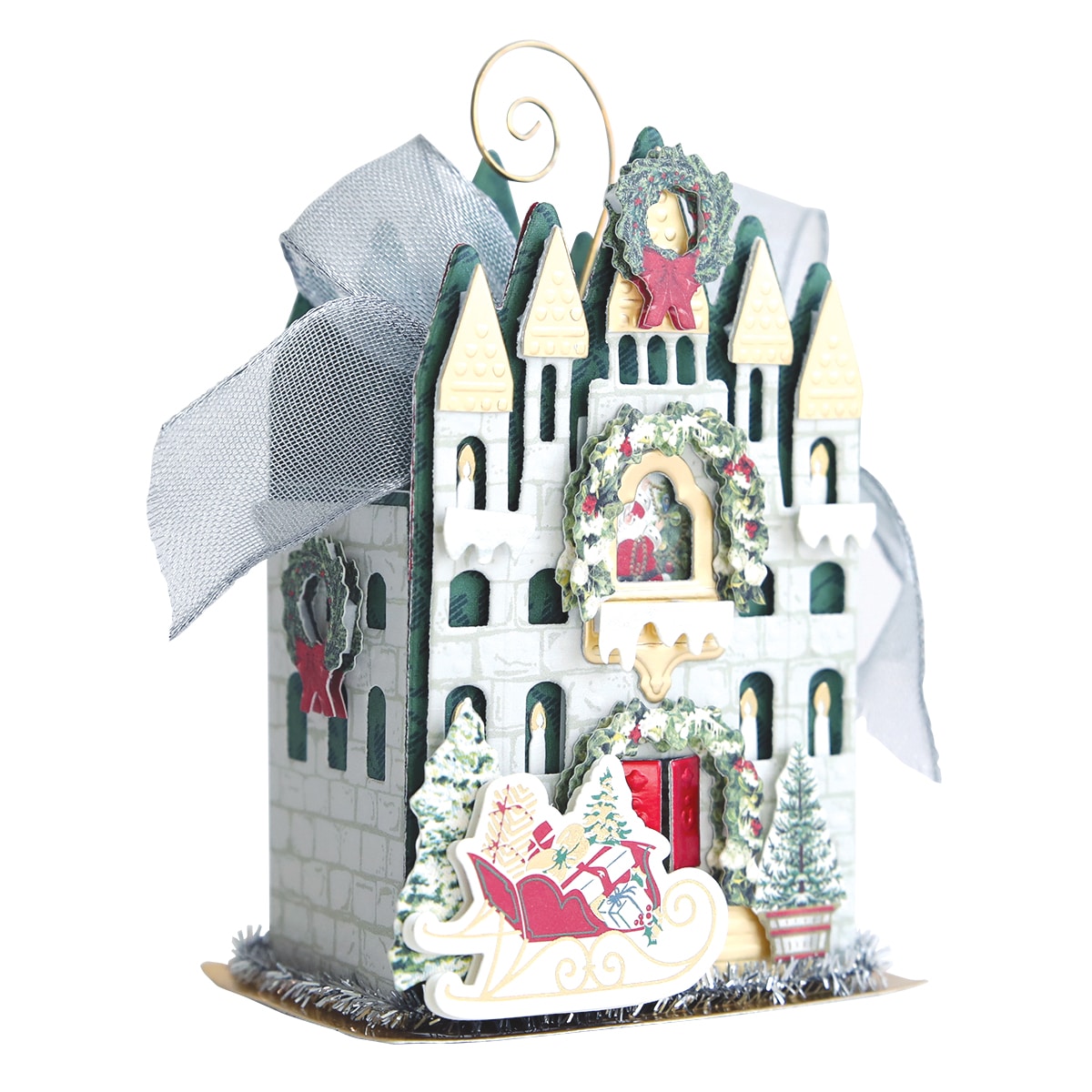 a christmas card with a castle on top of it.