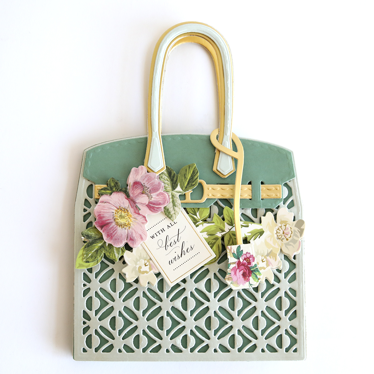 a purse with a tag and flowers on it.