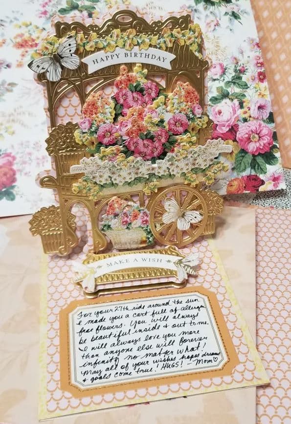 a close up of a card with flowers on it.