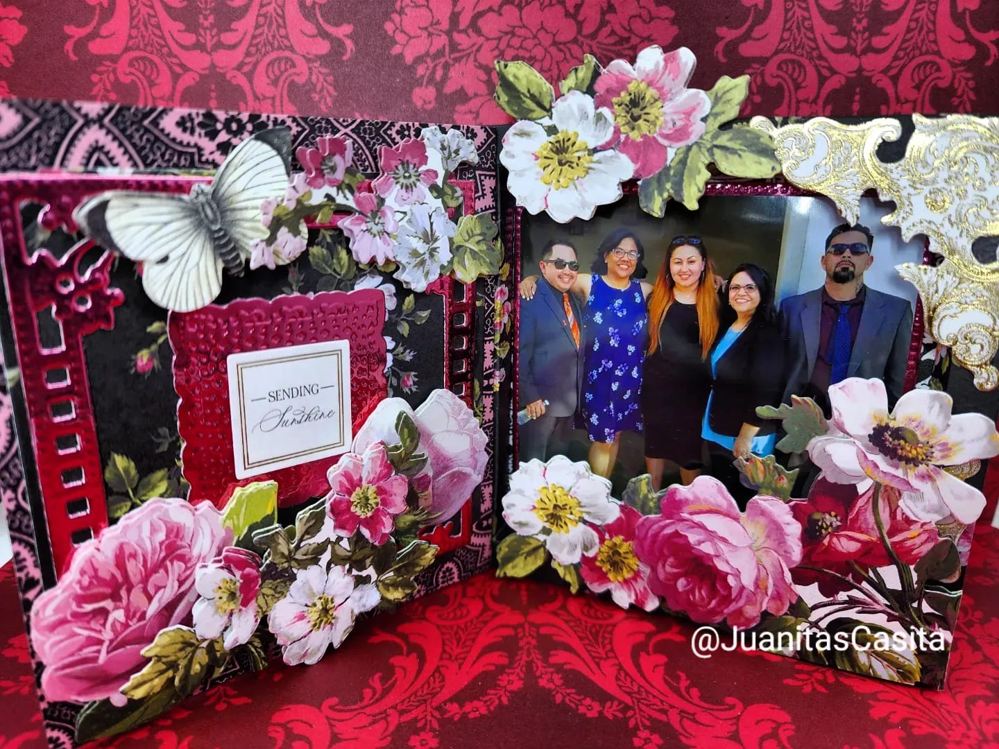 a picture frame with flowers and a couple.
