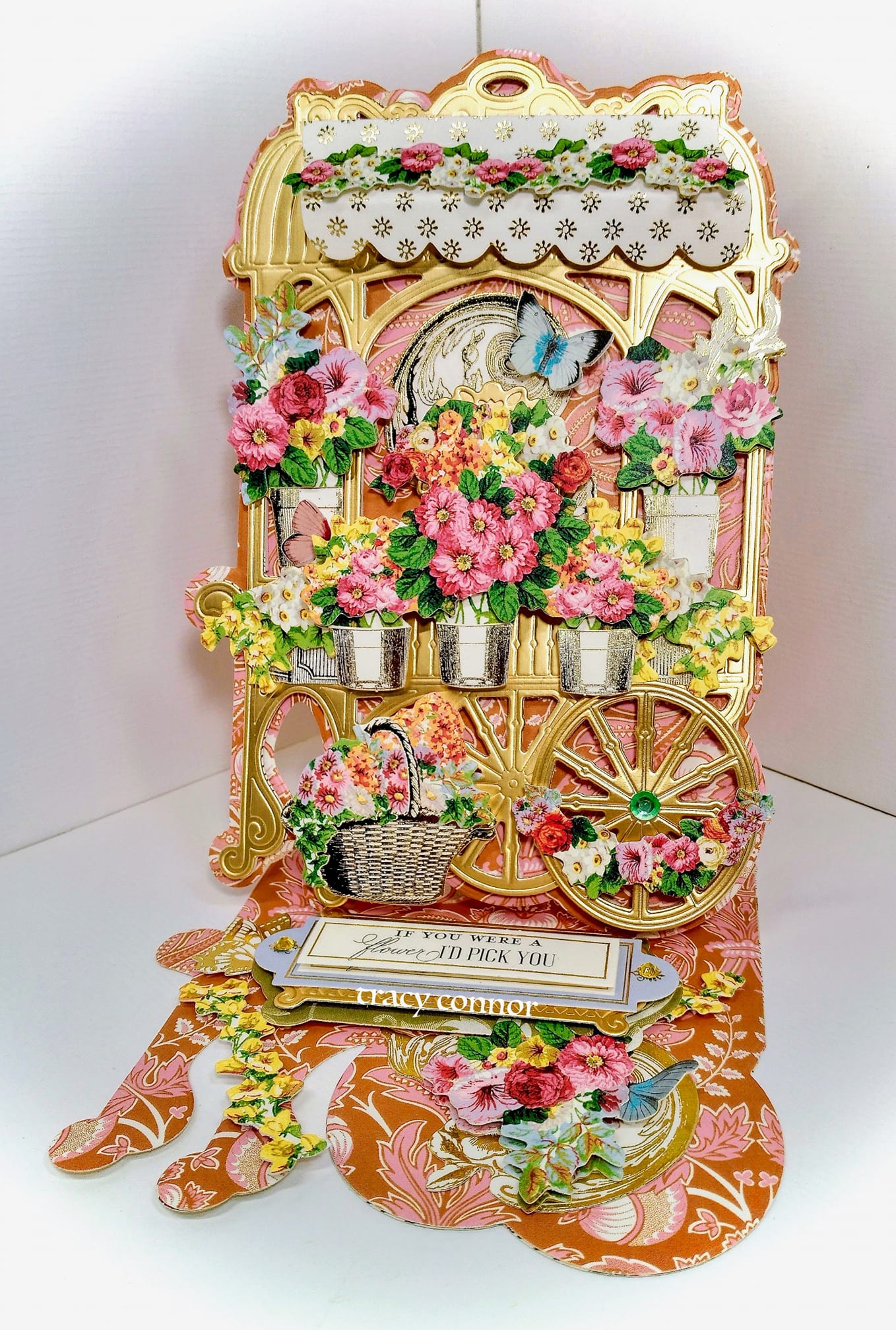 a decorative display of flowers and a clock.