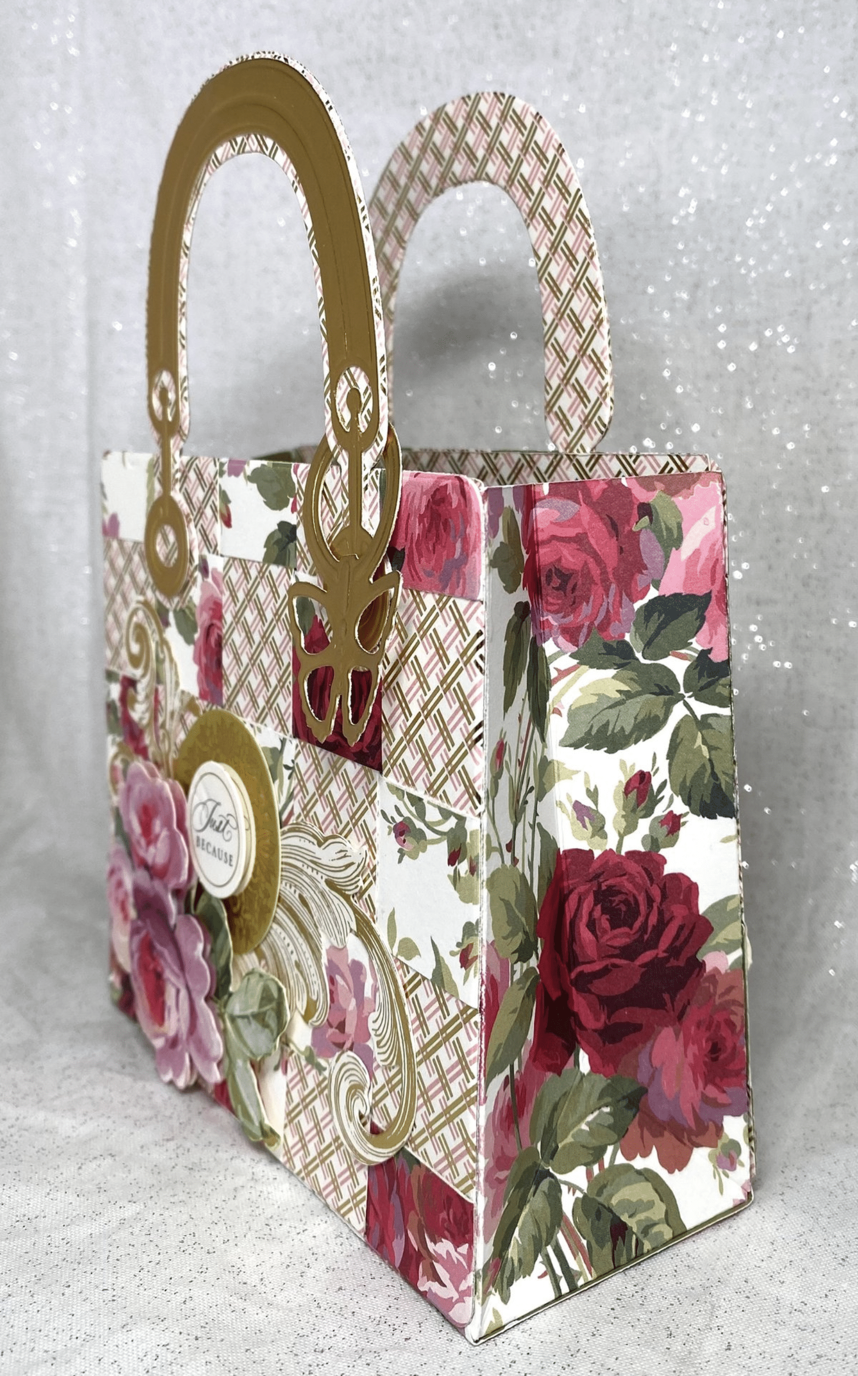 a small bag with a flower pattern on it.