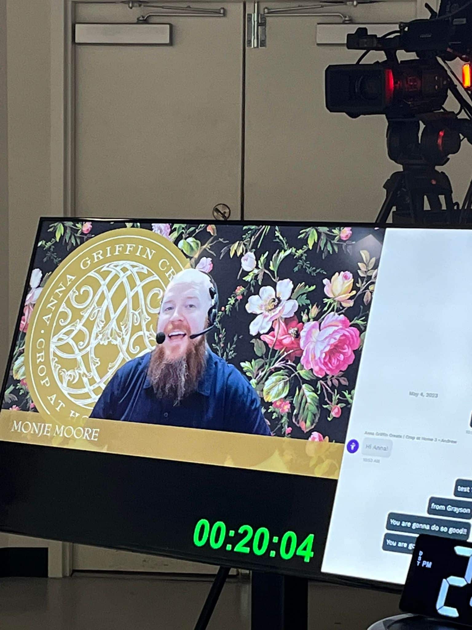 a television screen with a picture of a bearded man on it.