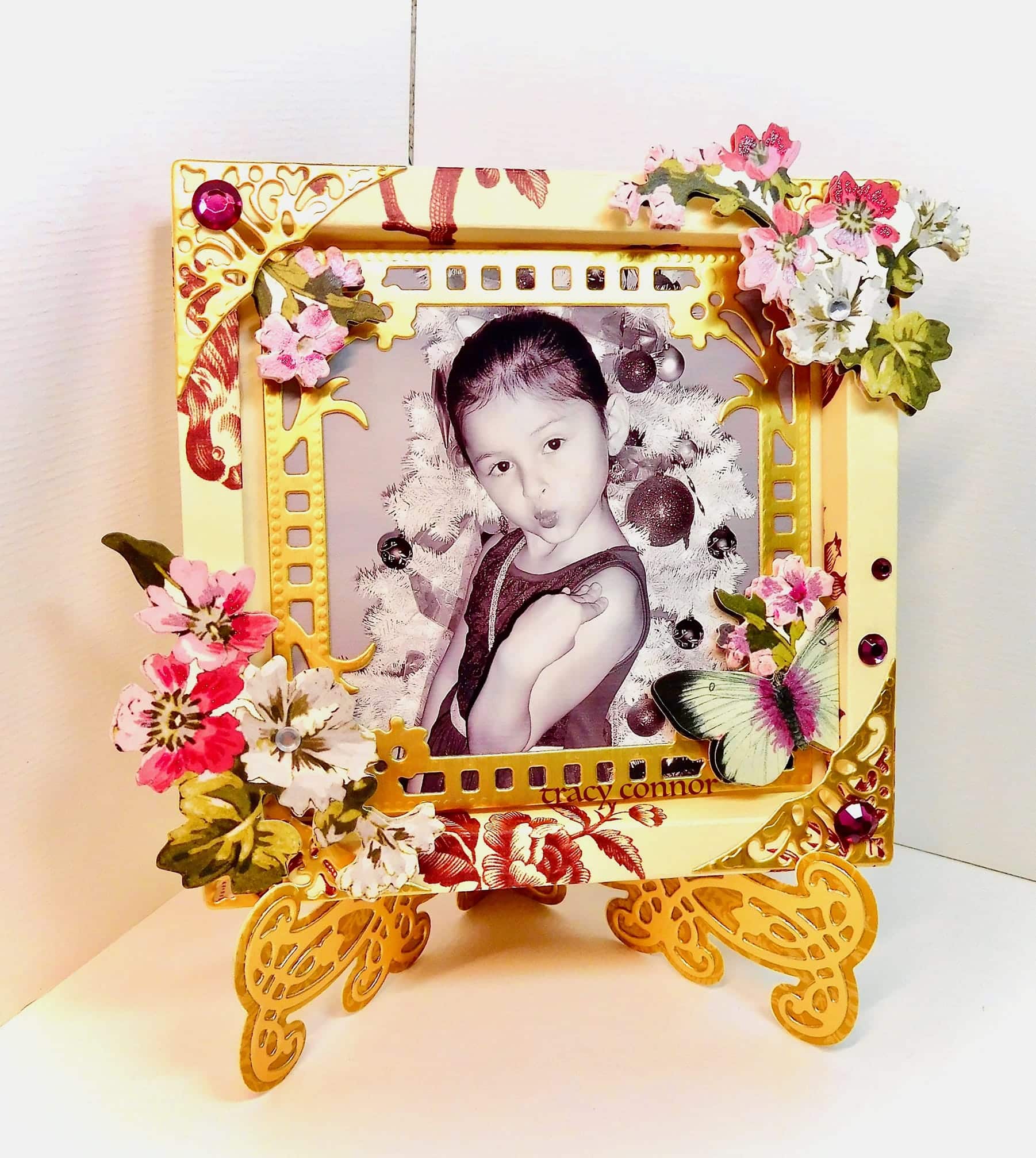 a picture frame with a picture of a child in it.