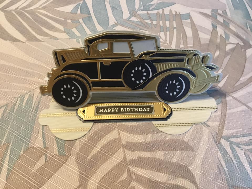 a birthday card with a car on it.
