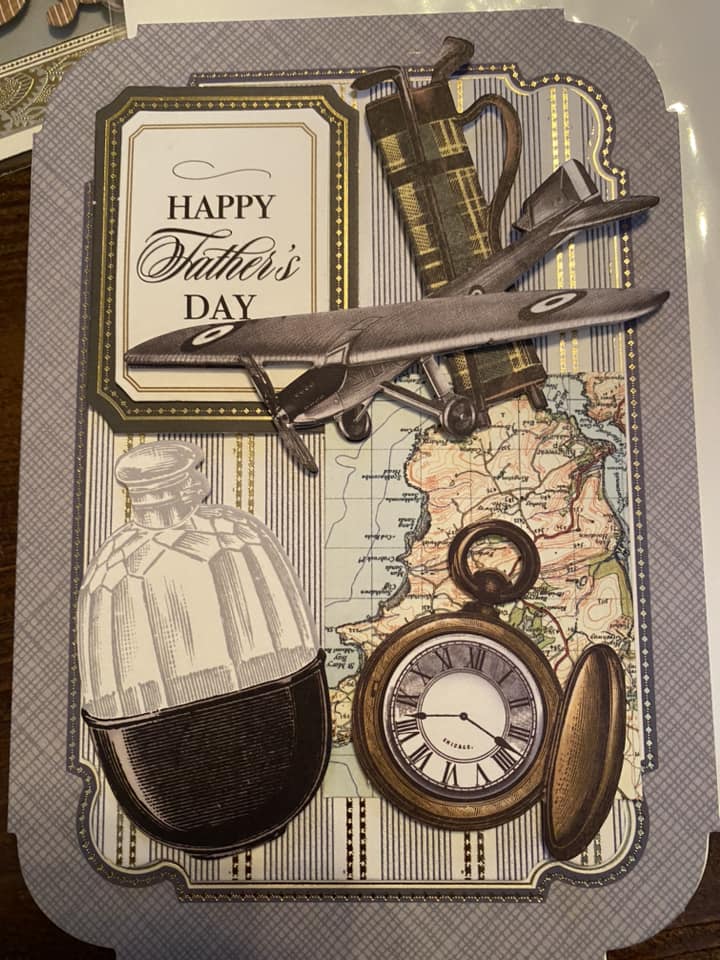 a happy father's day card with an airplane and a map.