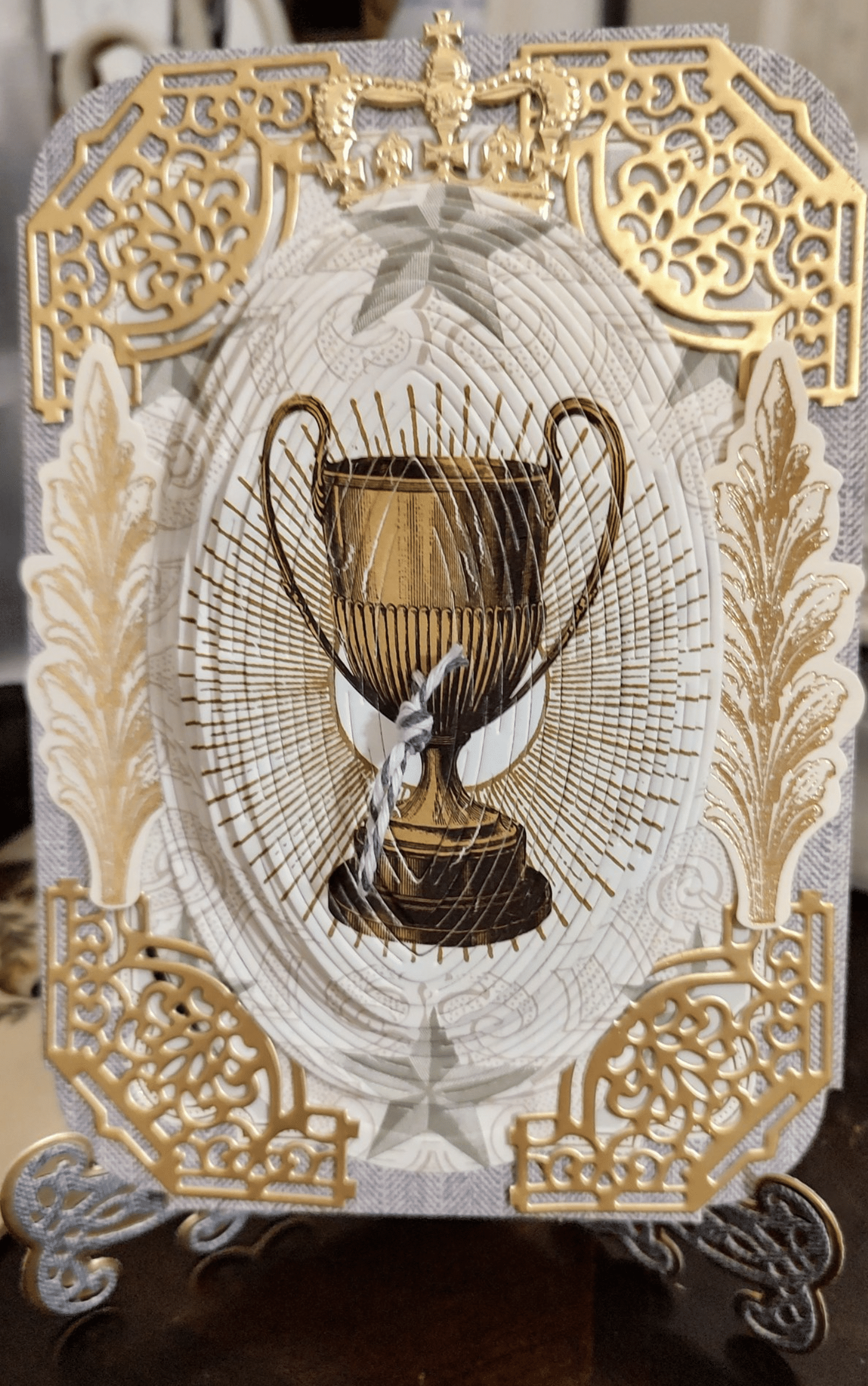a card with a picture of a trophy on it.