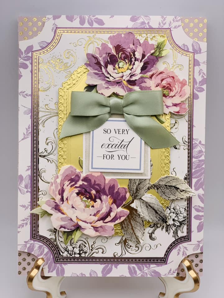 a close up of a card with flowers on it.