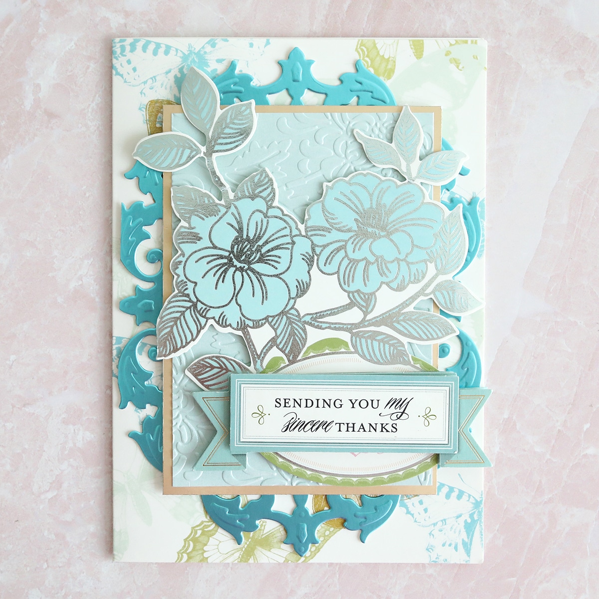 a close up of a card with flowers on it.