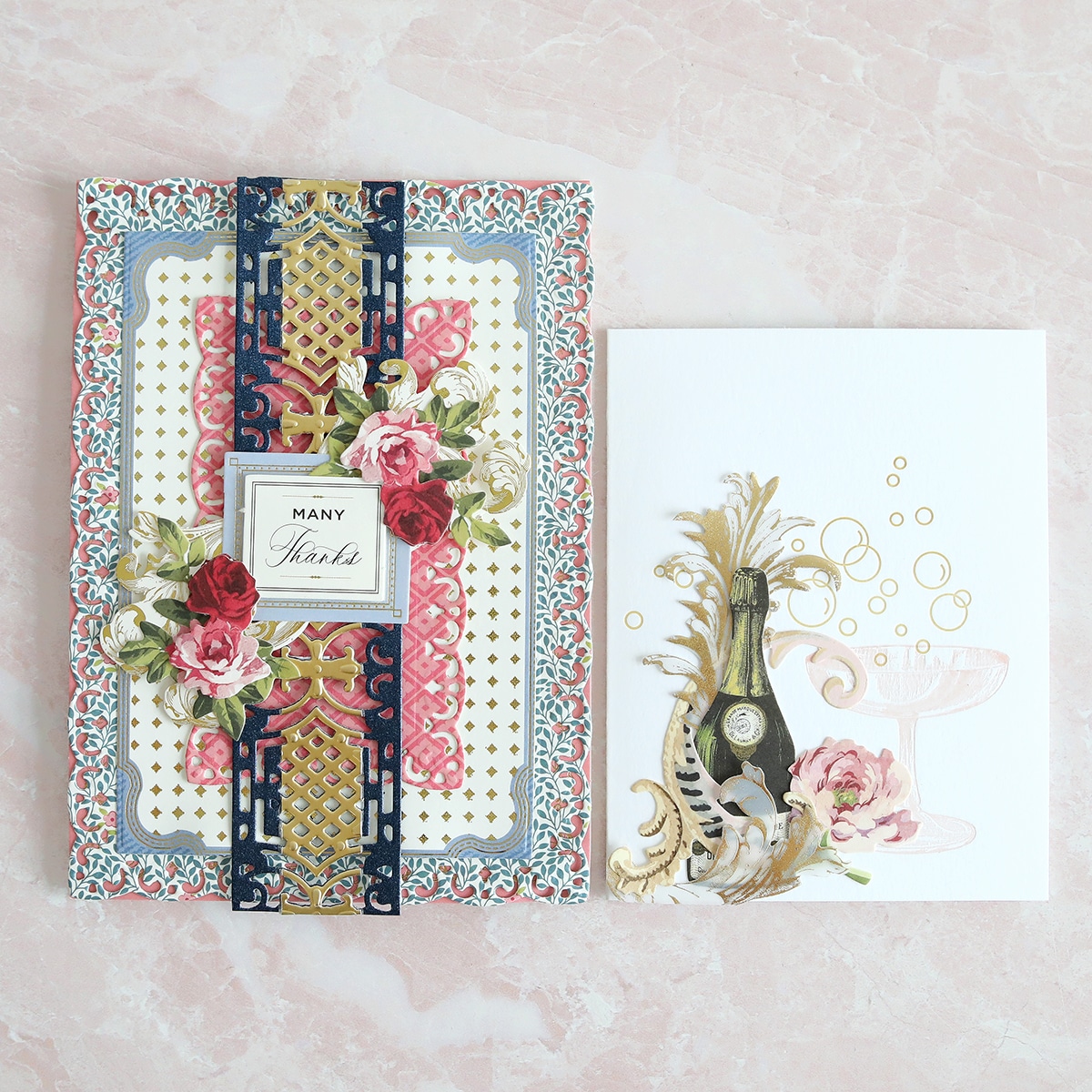 a card with a vase of flowers on it next to a greeting card.