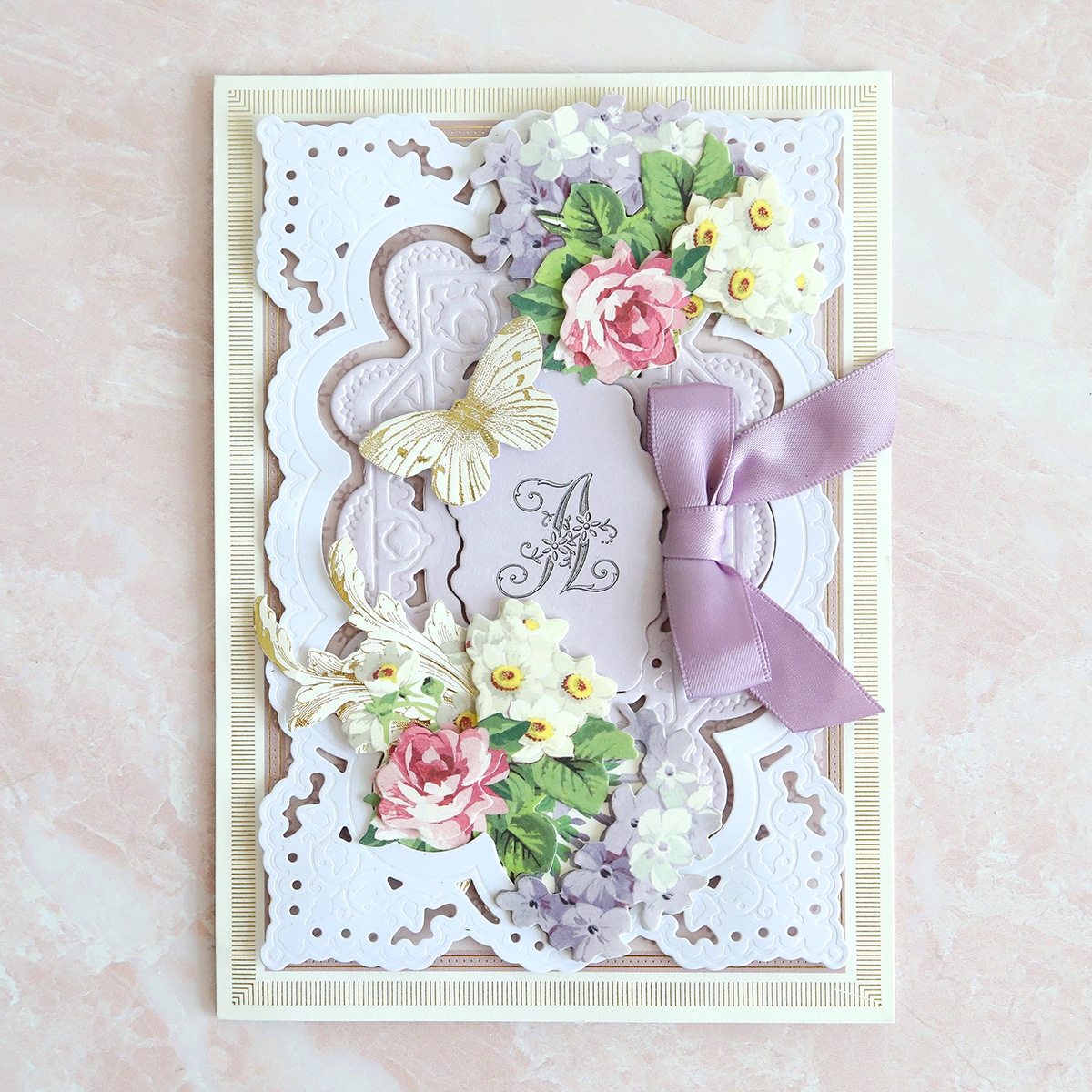 a card with butterflies and flowers on it.