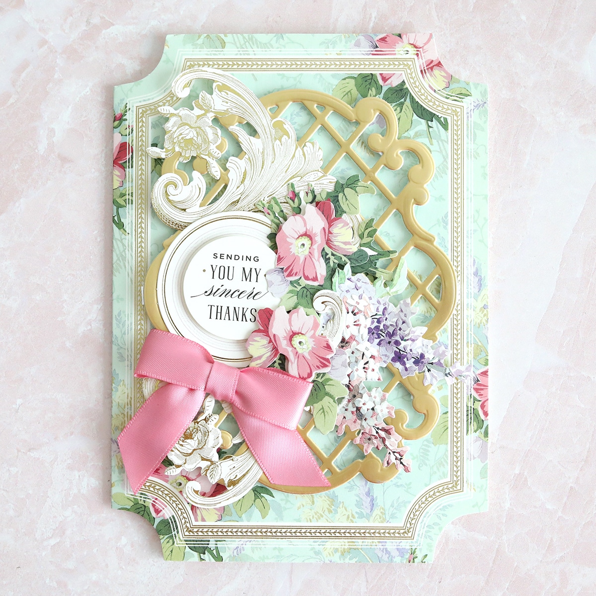 a close up of a greeting card with flowers.