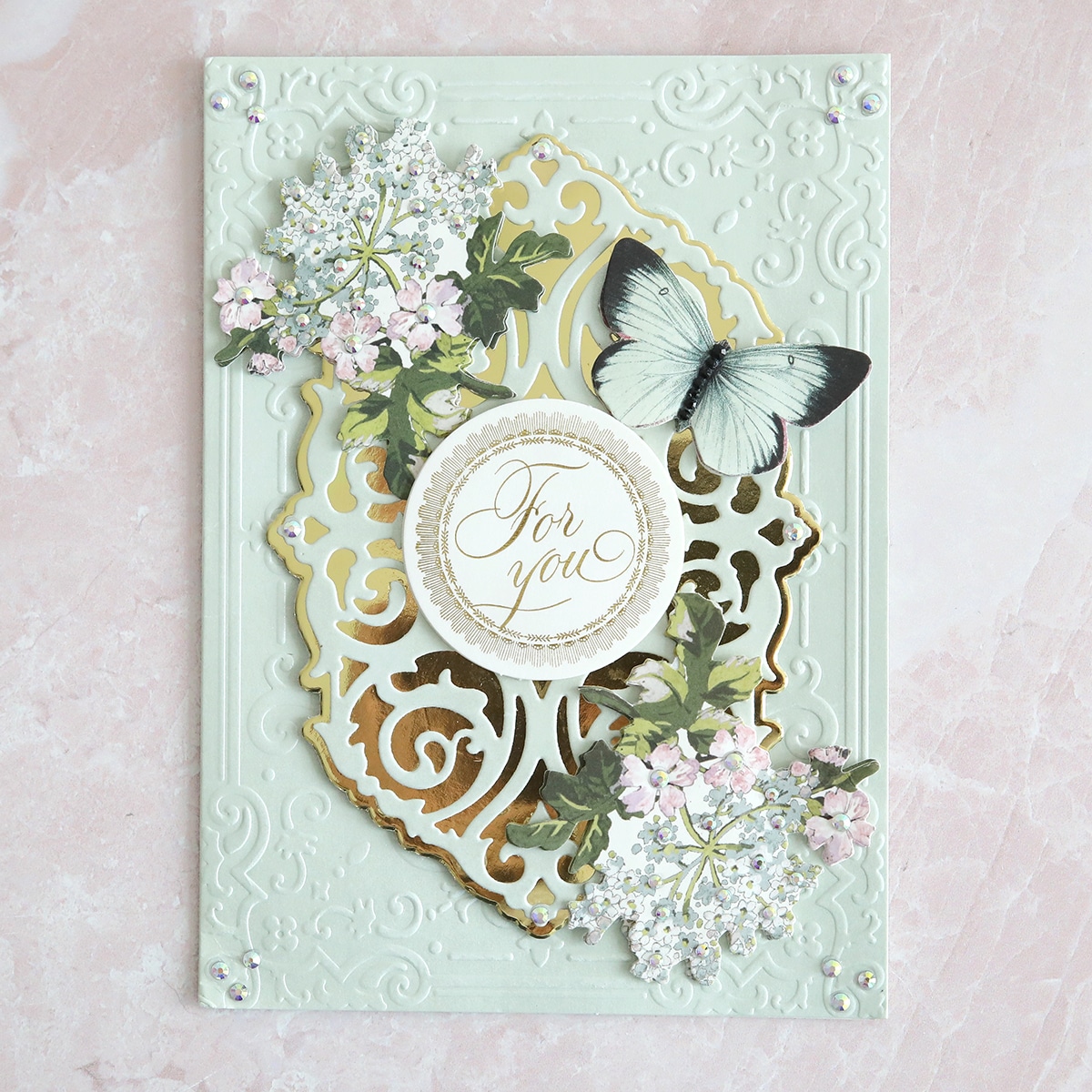 a close up of a card with a butterfly on it.