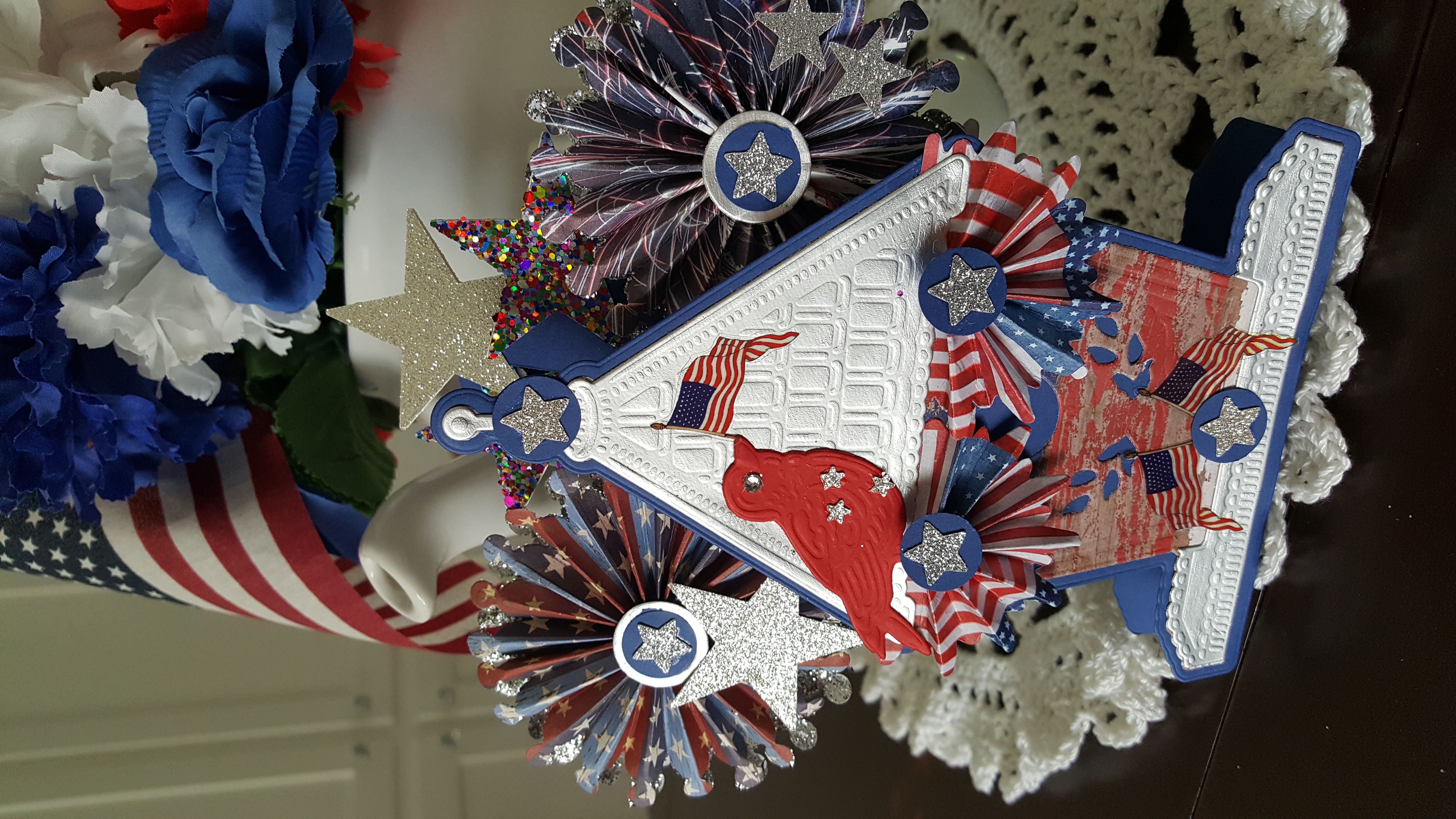 a red, white, and blue patriotic decoration on a table.