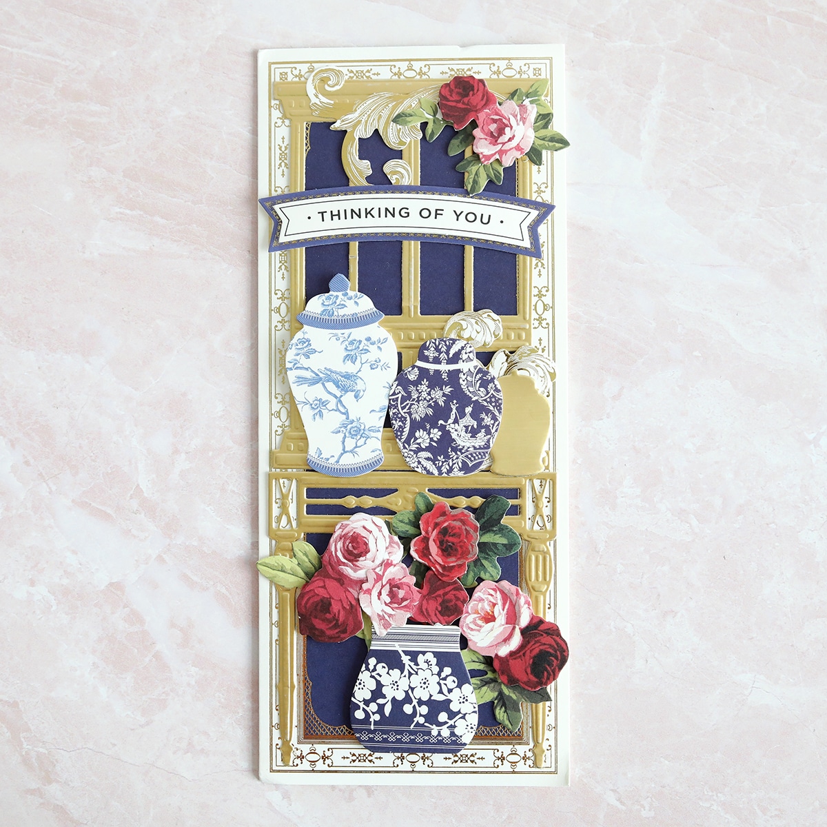 a card with flowers and vases on it.