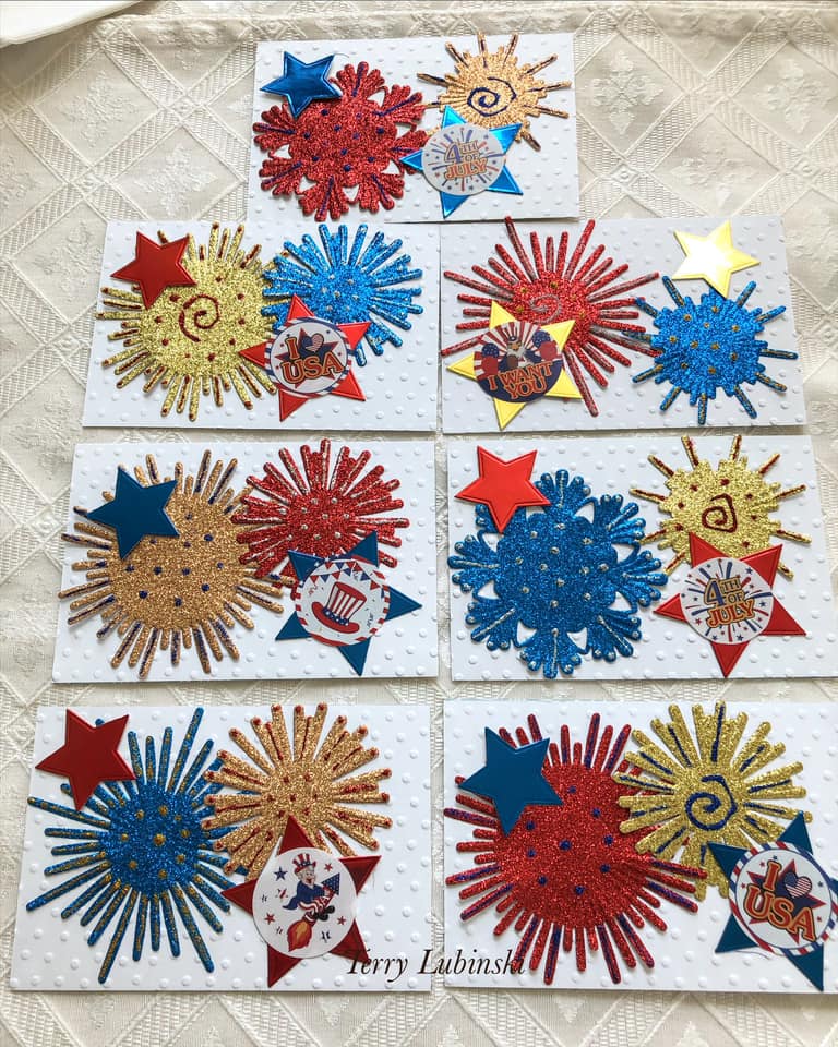 a close up of a quilt with red, white, and blue stars.