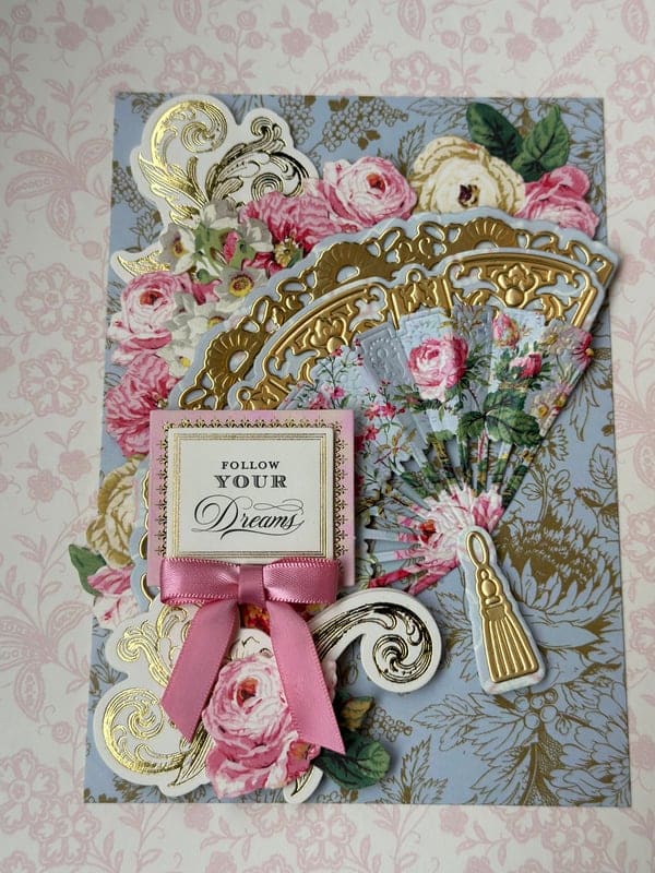 a close up of a greeting card with flowers.