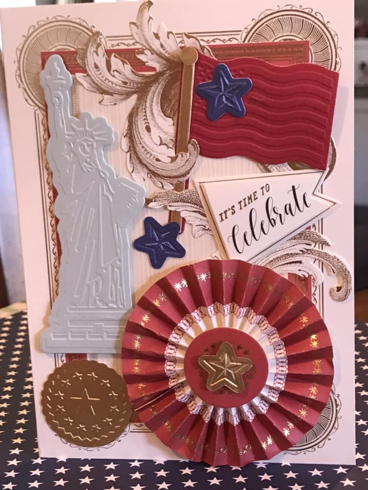 a patriotic card with a statue of liberty.