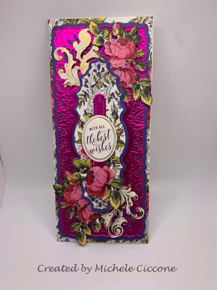 a pink and purple card with roses on it.
