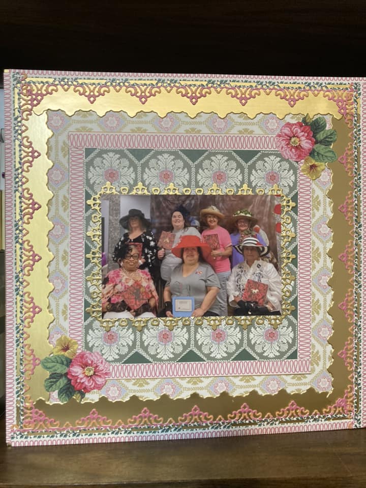 a photo frame with a group of people in pink hats.
