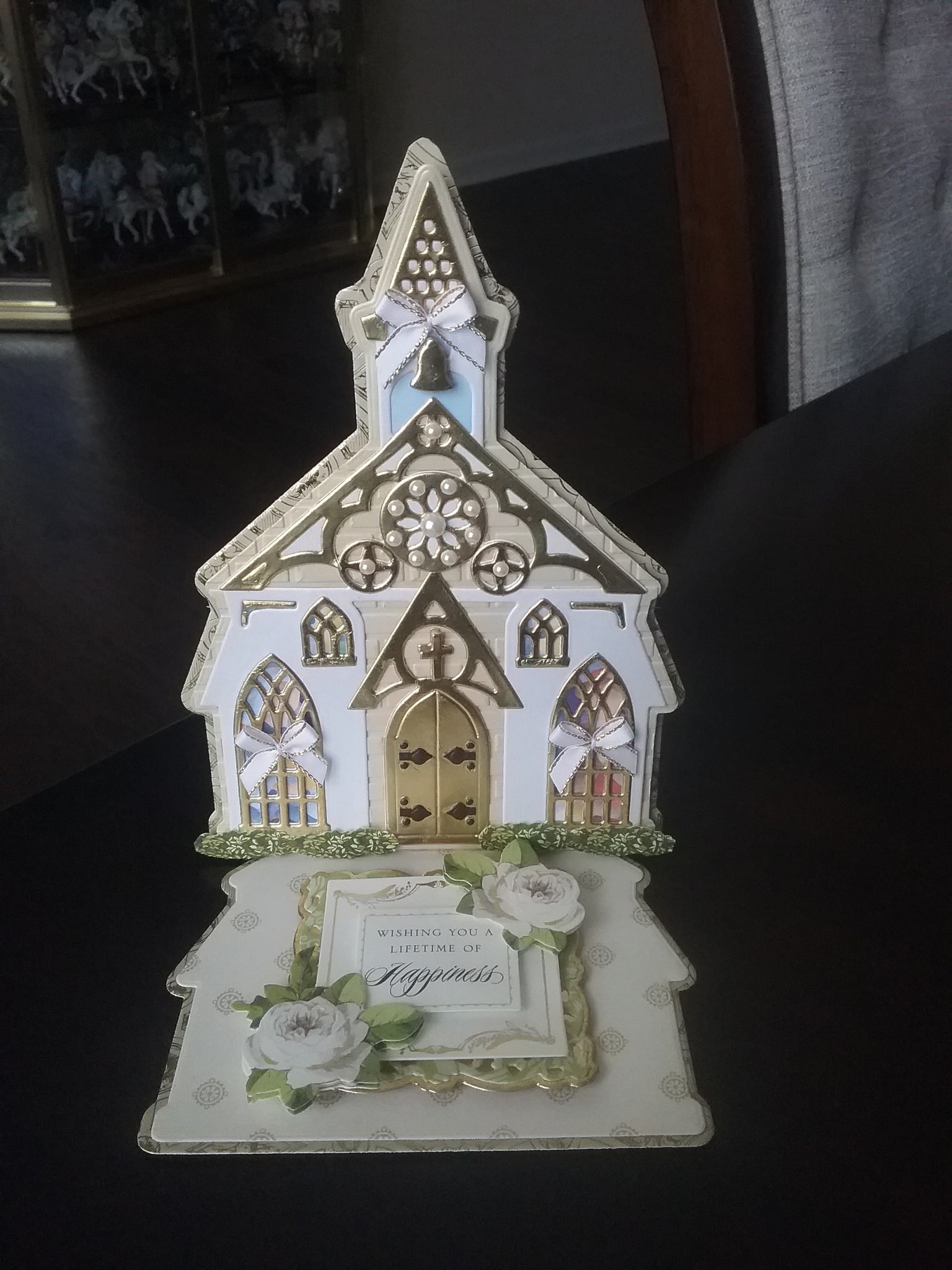 a wedding card with a church on it.