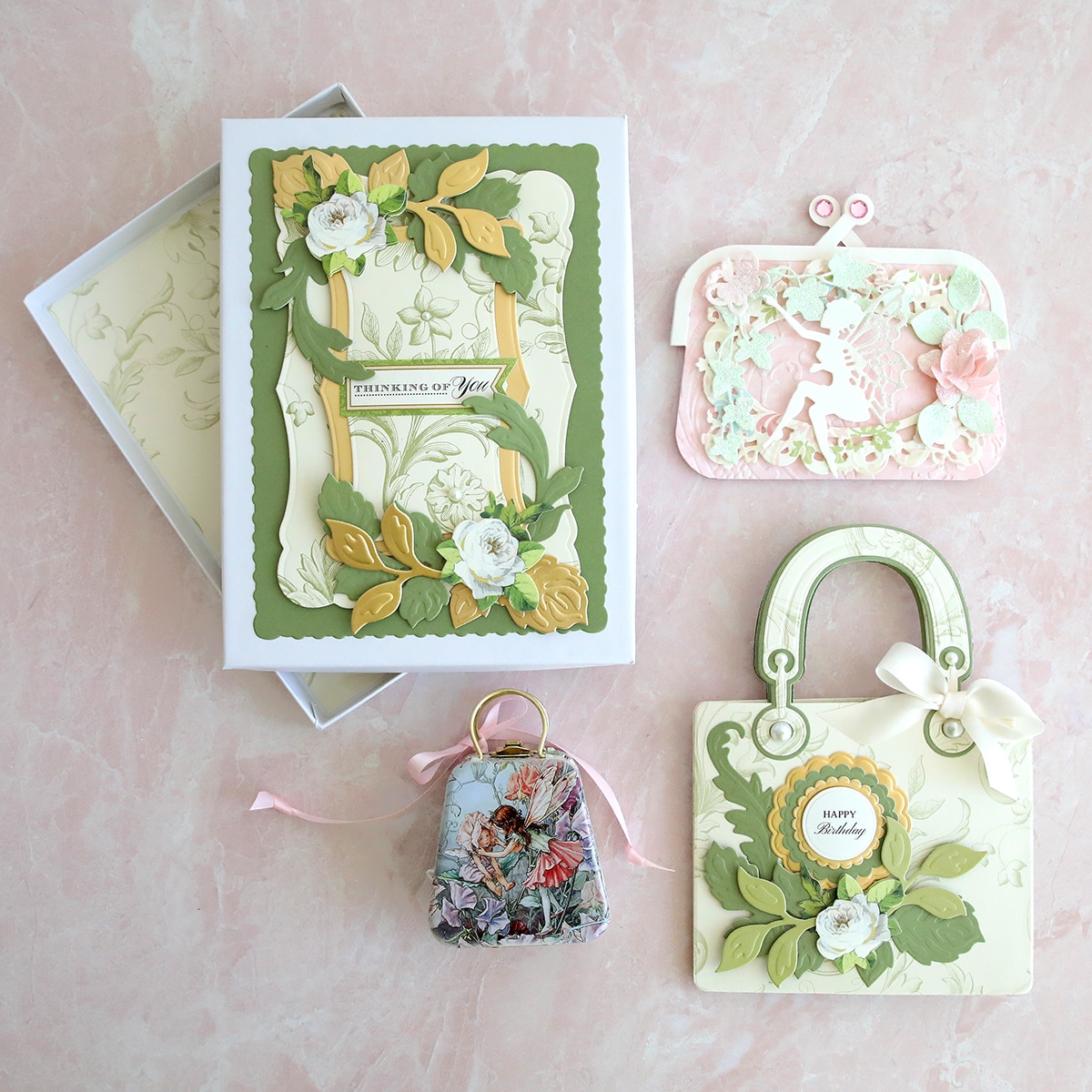 a set of cards with flowers and a purse.