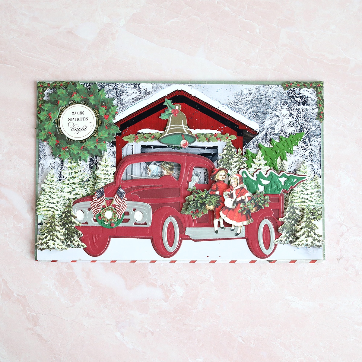 a christmas card with a red truck and santa claus.