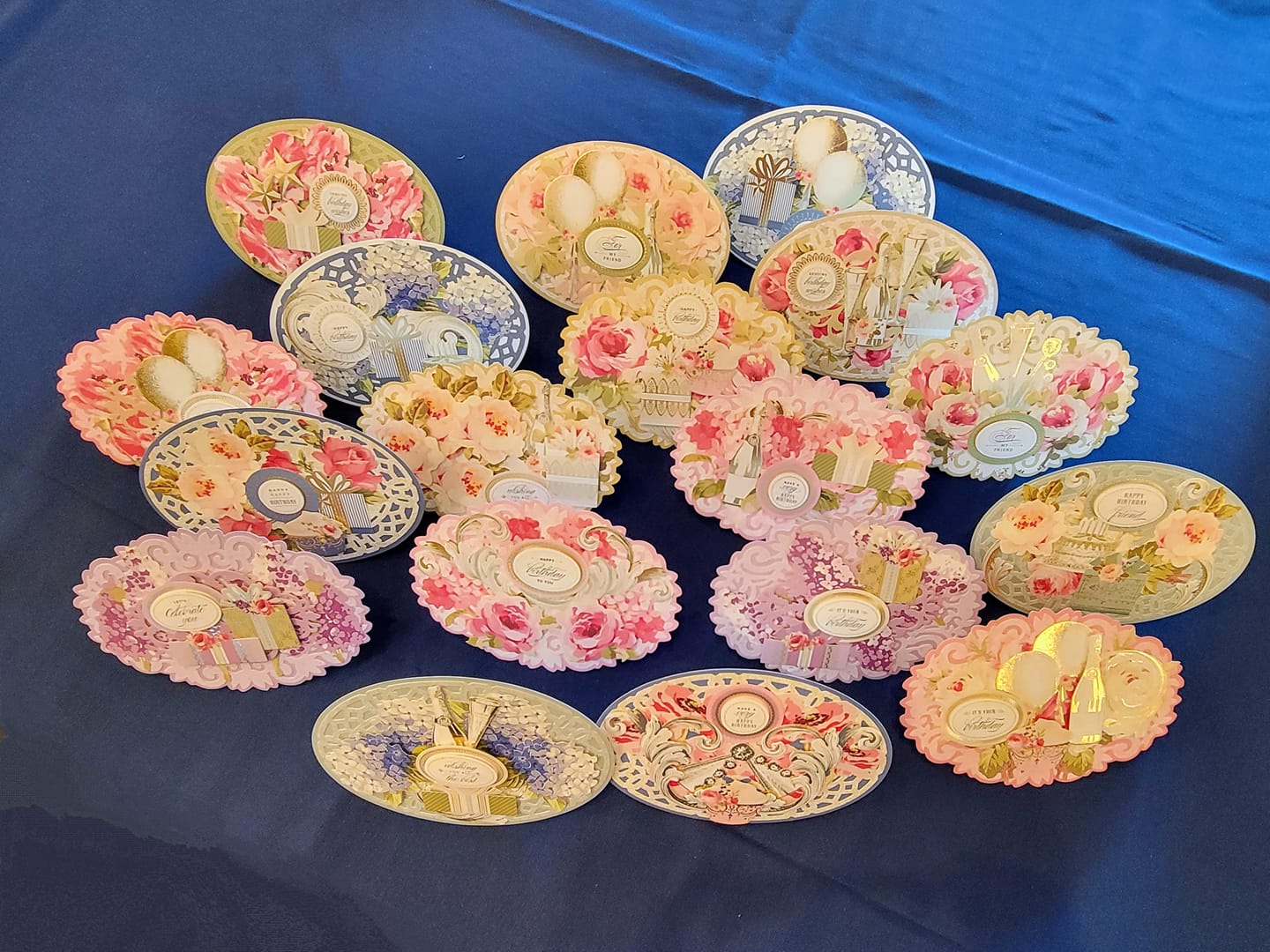 A group of cupcakes with floral designs on them.