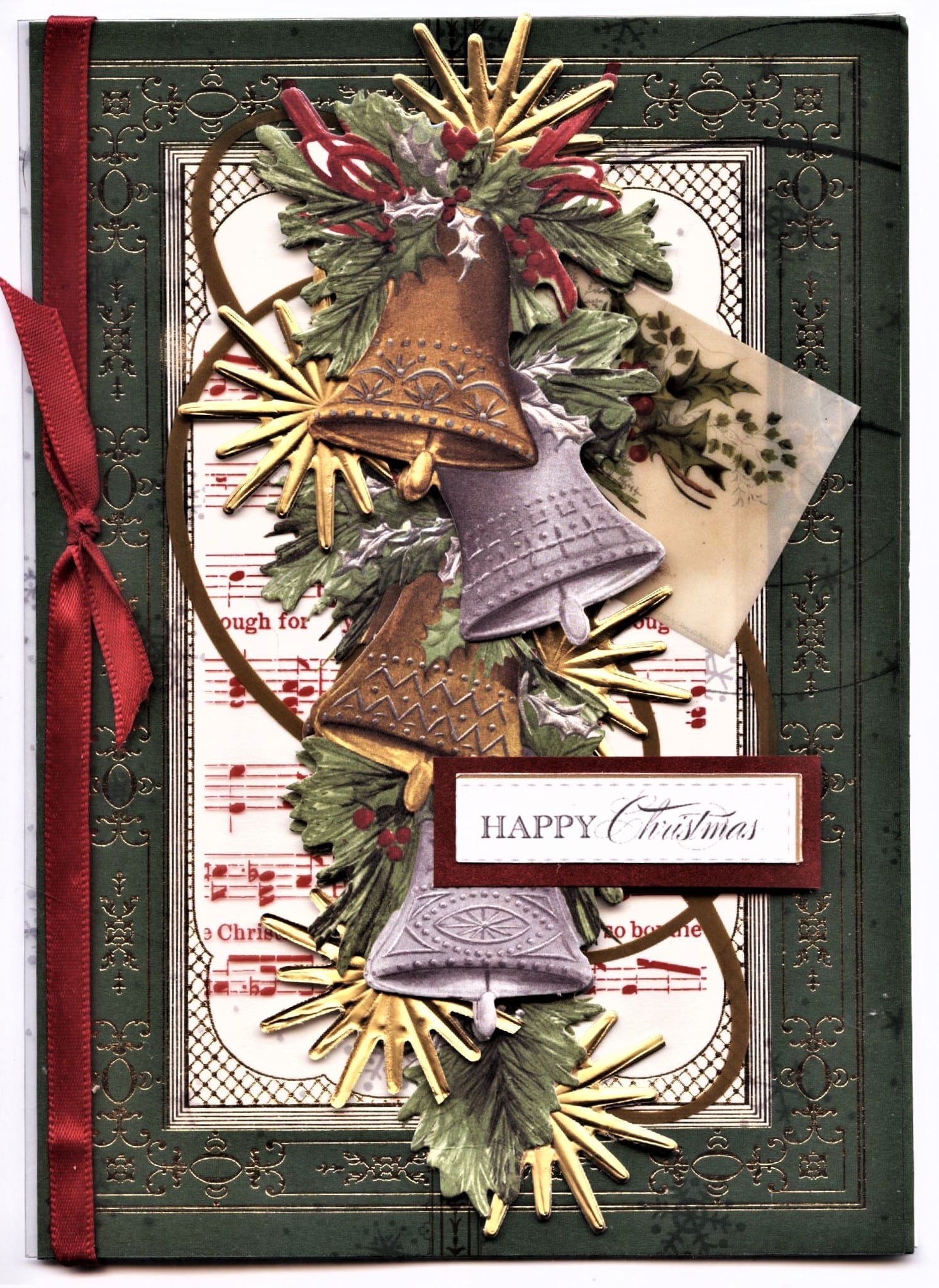 A christmas card with bells and ribbons.