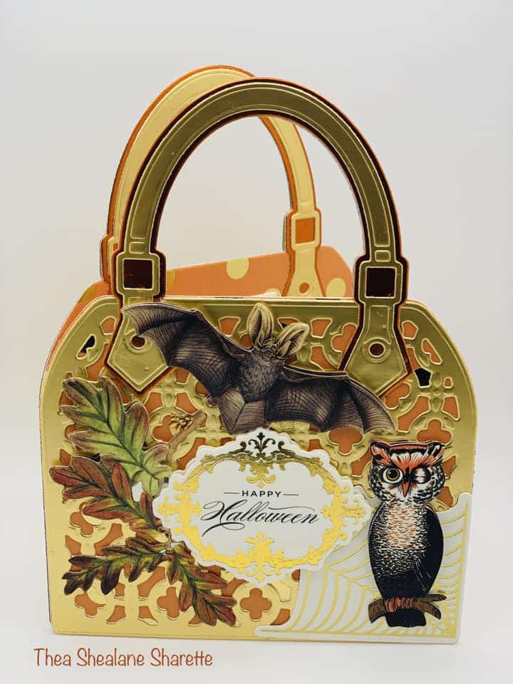 A bag with owls and bats on it.