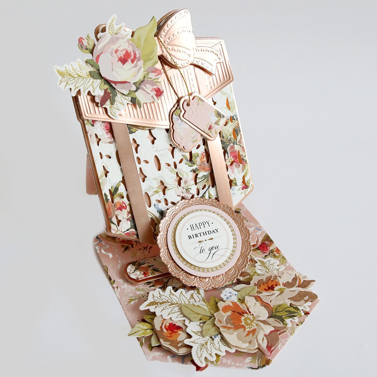 A card with flowers and a gift box.