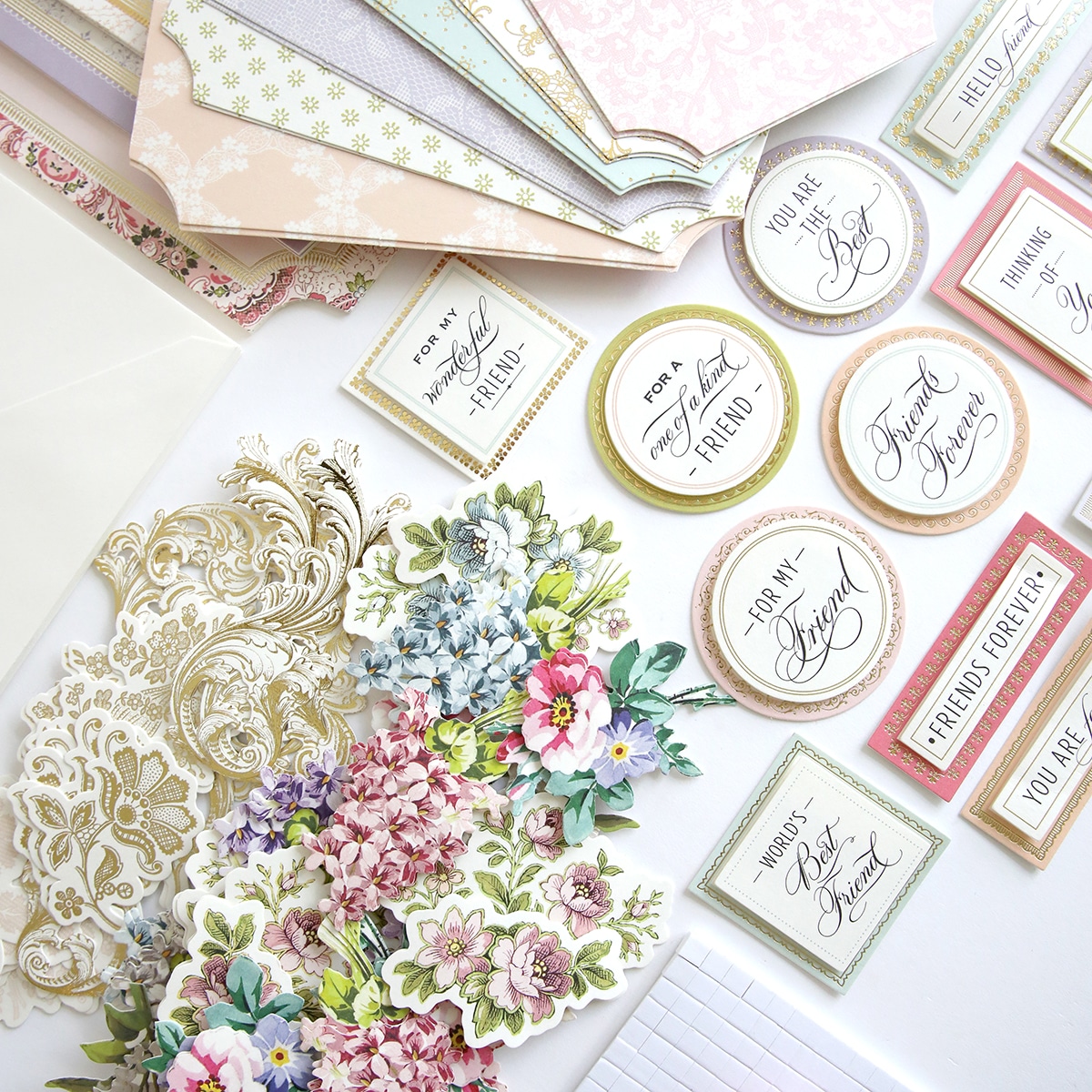 The Simply Friendship Card Making Kit and papers are laid out on a table.