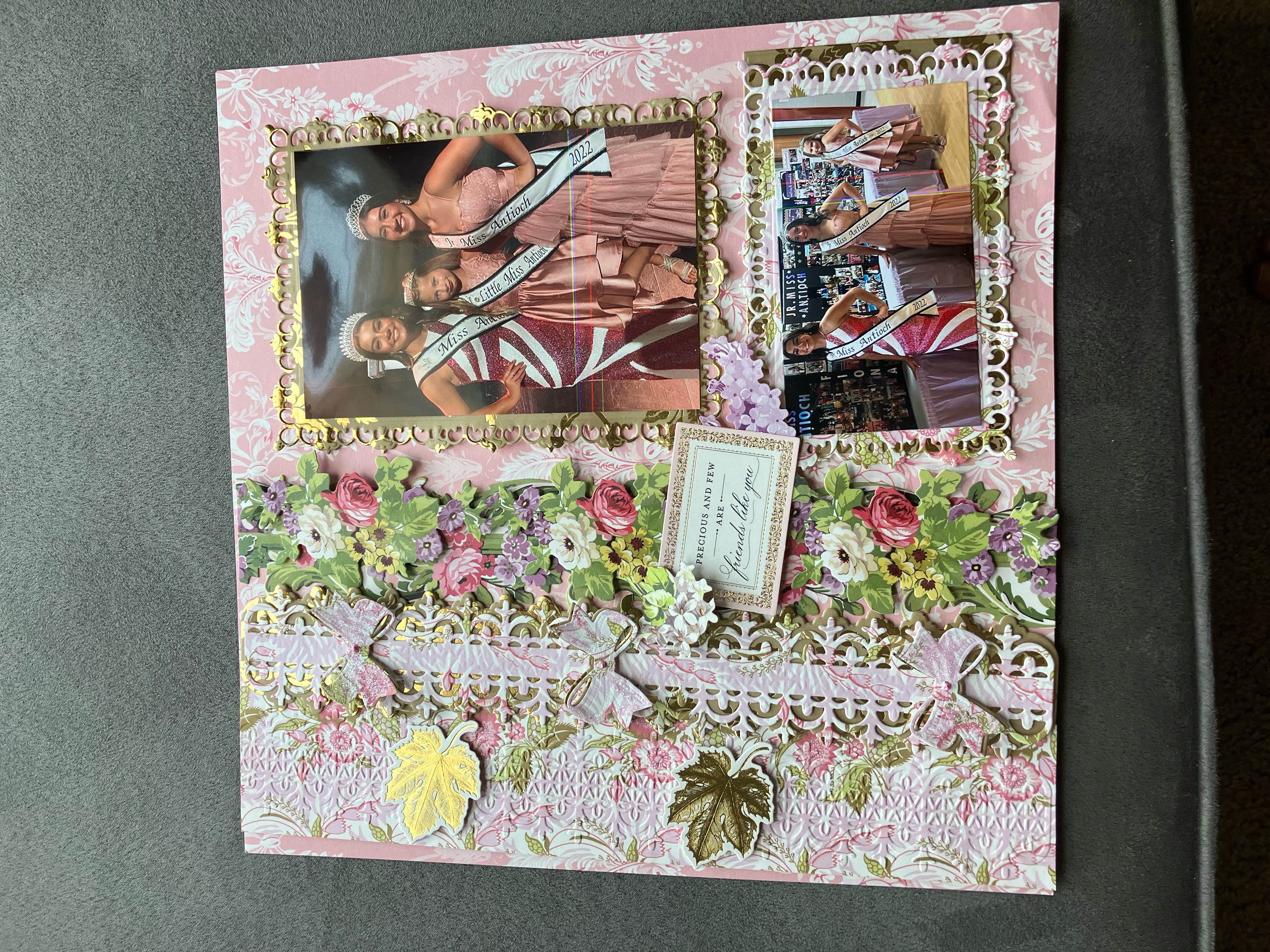 A scrapbook with a picture of a girl and a flower.