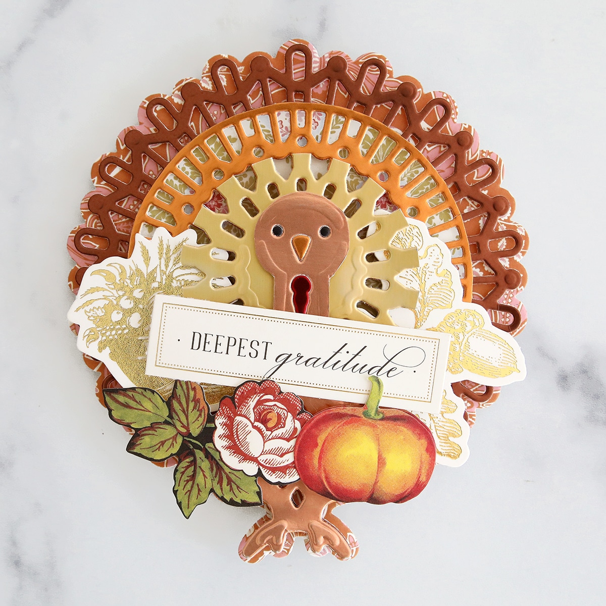 A card with a turkey and flowers on it.