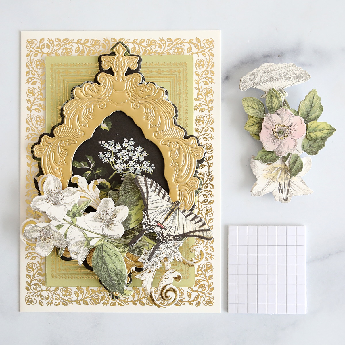 A card with flowers and a notepad.
