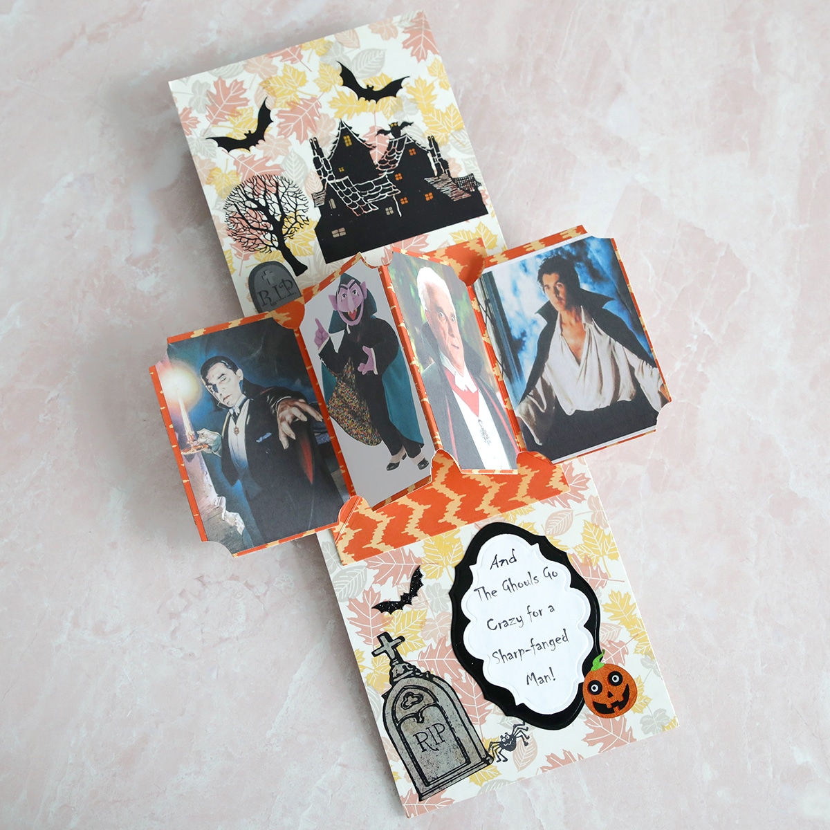 A halloween pop up card with pictures on it.
