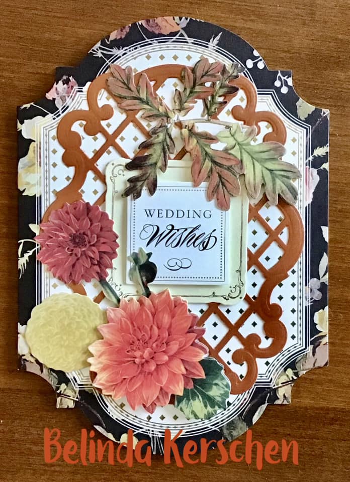 A card with flowers and leaves on it.