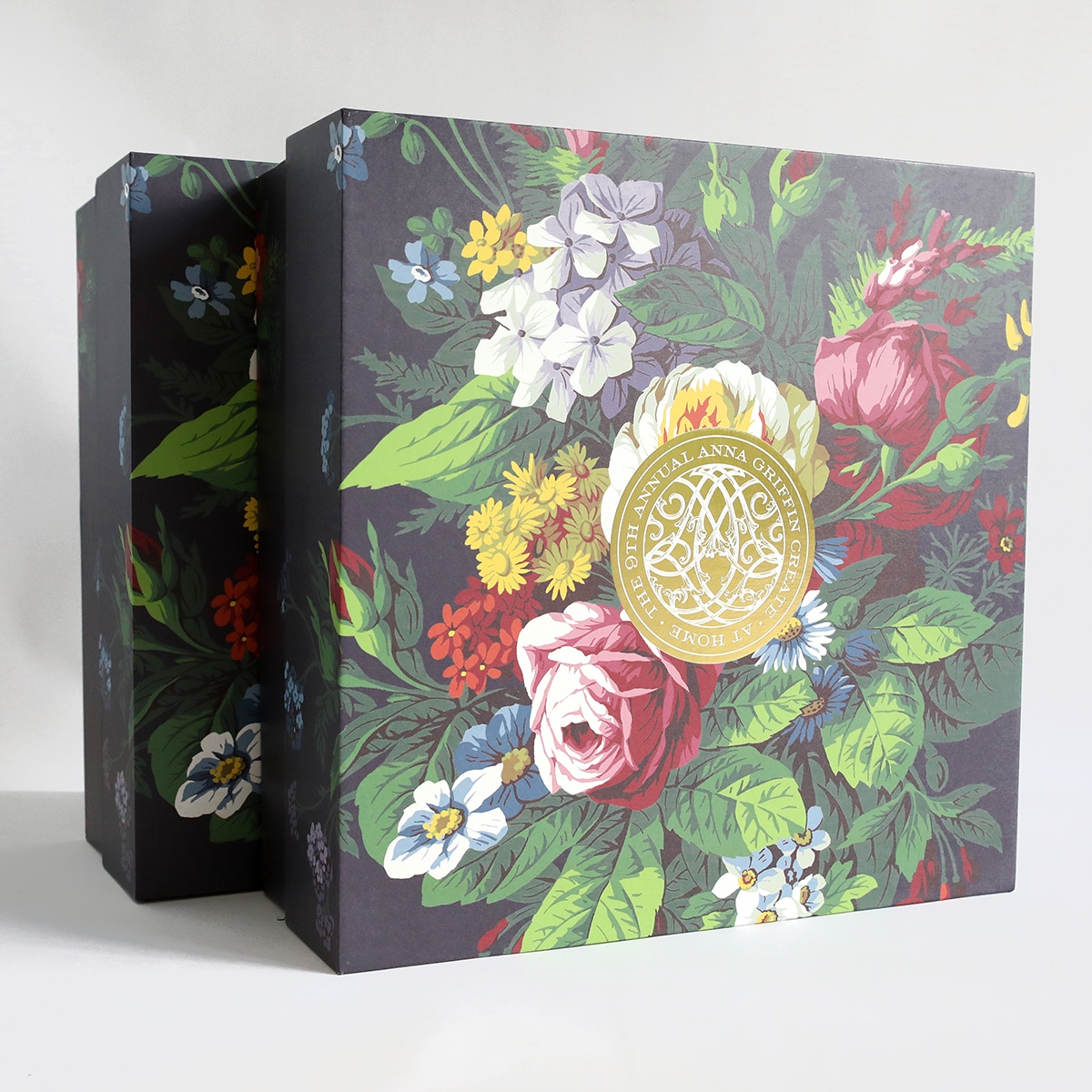 A black box with a floral design on it.