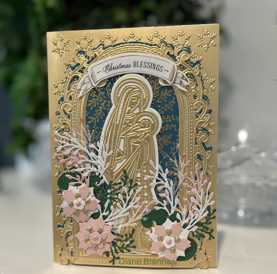 A christmas card with the image of the virgin mary.