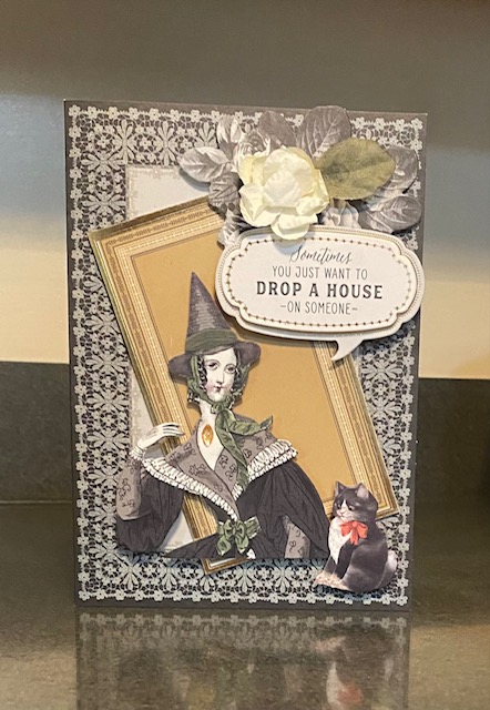 A card with a witch on it.