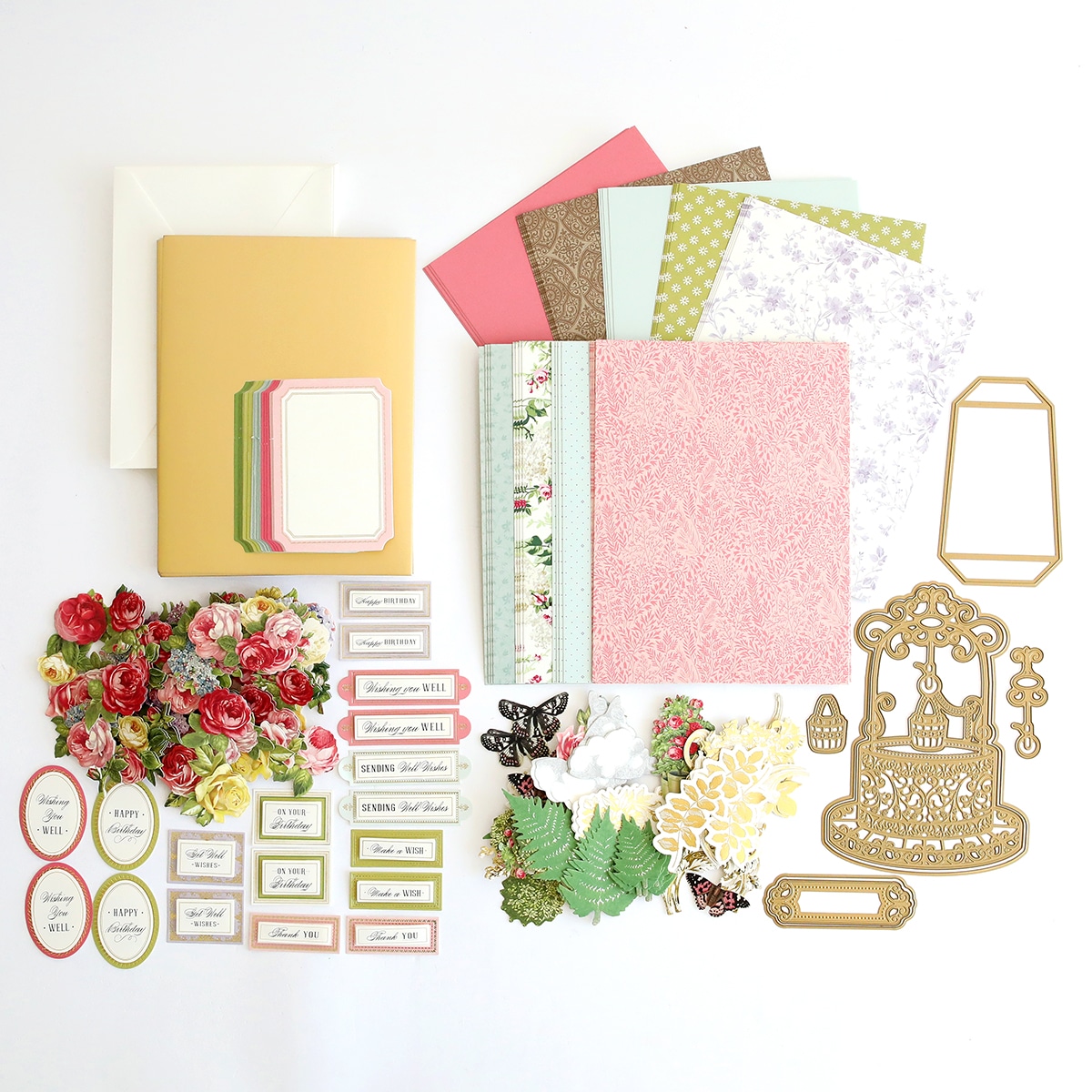 A collection of scrapbooking supplies, including cards and paper.
